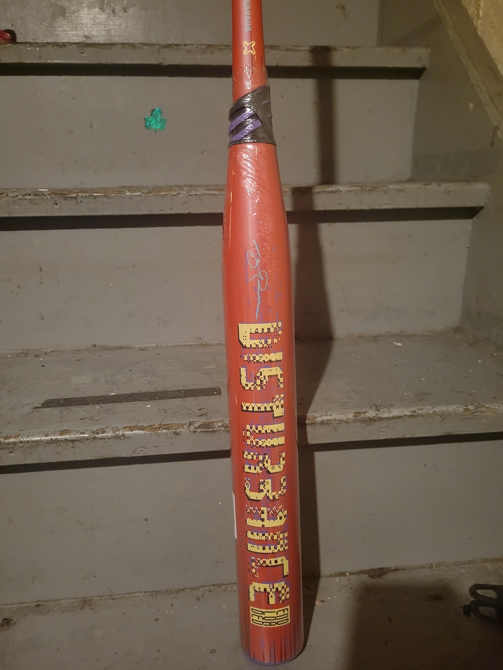 Orange Seniors Baseball Bat with Yellow Graphics 27 Oz